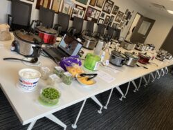 15 crockpots of chili, complete with all the fixings, line each side of the long conference room table at EnviroScience.