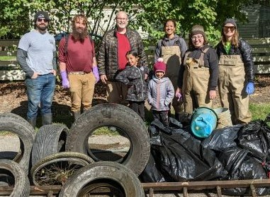 EnviroScience Volunteers Pose with Debris Removed from the Little Cuyahoga River