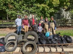 EnviroScience Volunteers Pose with Debris Removed from the Little Cuyahoga River