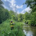 EnviroScience Senior Macroinvertebrate Taxonomist Rhonda Mendel Performing Fieldwork