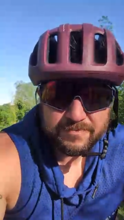 Jimmy Sargiovanni, Compliance Operations Manager at EnviroScience, cycling outdoors after logging 121.5 miles for National Bike Month 2025.