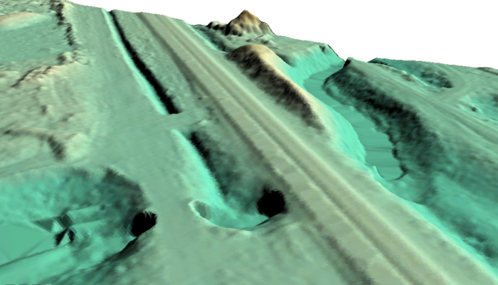 3D LiDAR terrain model showing elevation and topographic features for GIS-based site analysis.