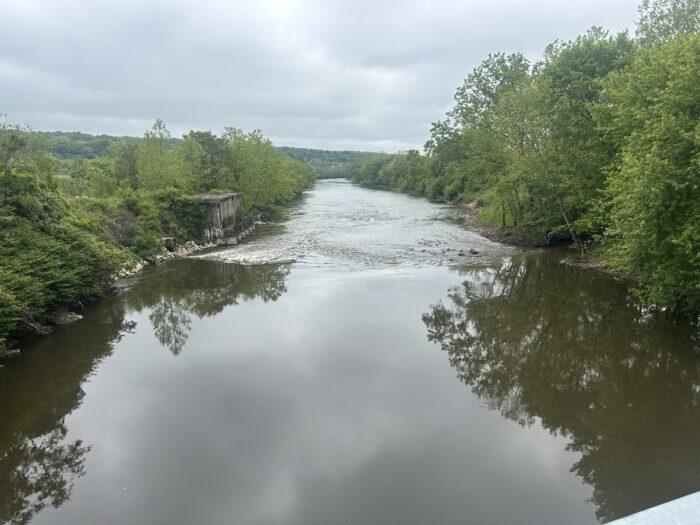 Free-flowing Mahoning River at Struthers, Ohio, following dam removal, with restored channel and tree-lined banks.